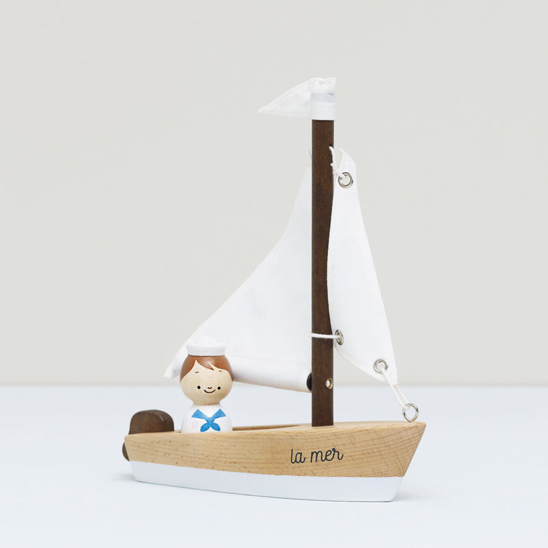 Wooden Sailing Boat and Captain