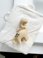 Apply the Dino-Dragon Teether