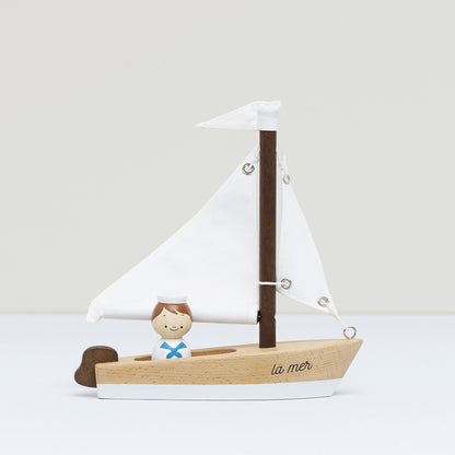 Wooden Sailing Boat and Captain